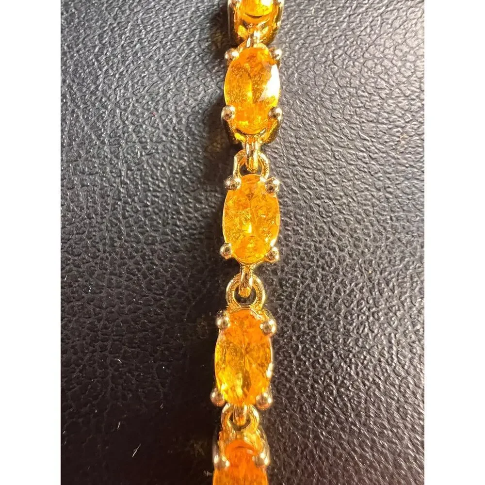 Yellow spessartine garnet tennis bracelet in gold over sterling silver